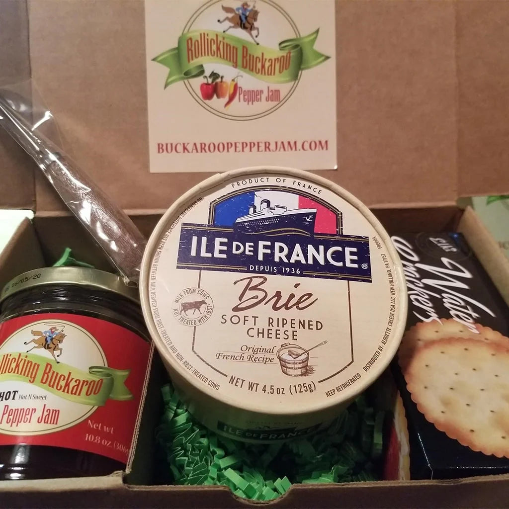 Rollicking Buckaroo nosh box filled with Pepper Jam and Brie cheese and crackers