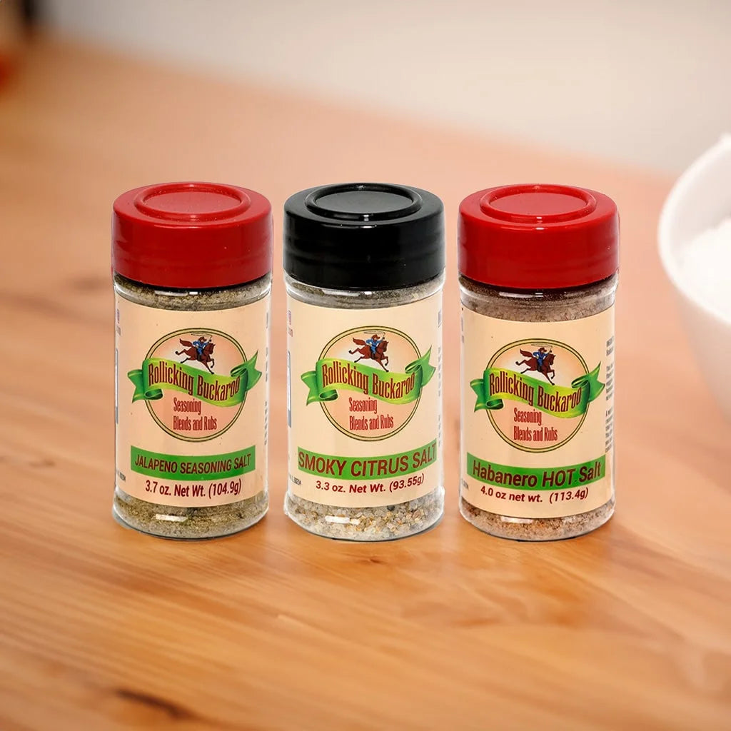 jalapeno seasoning salt, smoky citrus salt, and habanero hot salt seasoning blends next to each other on a kitchen counter top