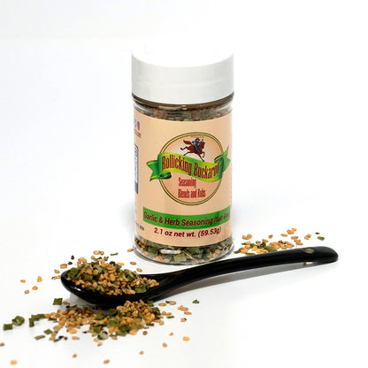 garlic and herb salt free seasoning blend bottle and spoon with seasoning on it