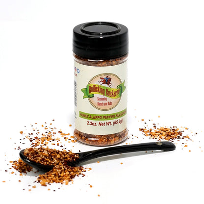 honey aleppo pepper seasoning blend bottle and spoon with seasoning on it