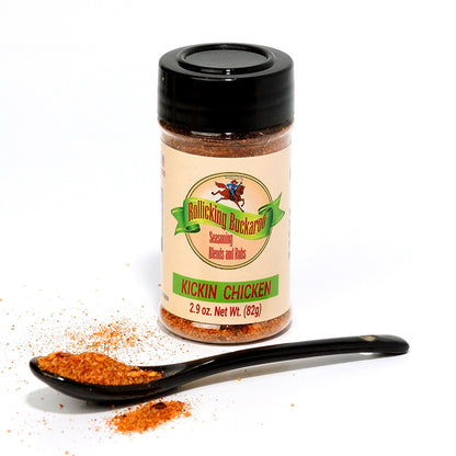 kickin chicken seasoning blend bottle and spoon with seasoning on it