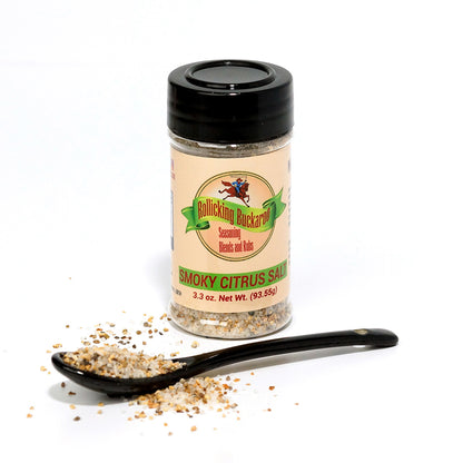 smoky citrus salt seasoning blend bottle and spoon with seasoning on it