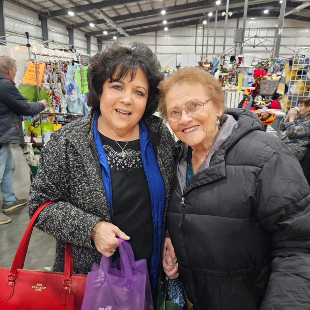 Rollicking Buckaroo customers holding jars of Rollicking Buckaroo Pepper Jam