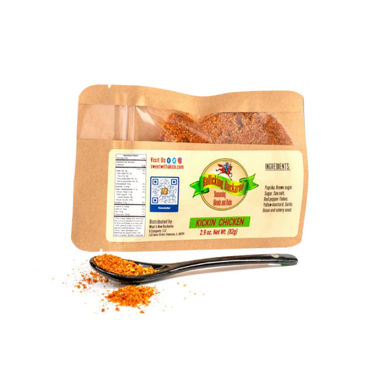 kickin chicken seasoning blend pouch and spoon with seasoning on it