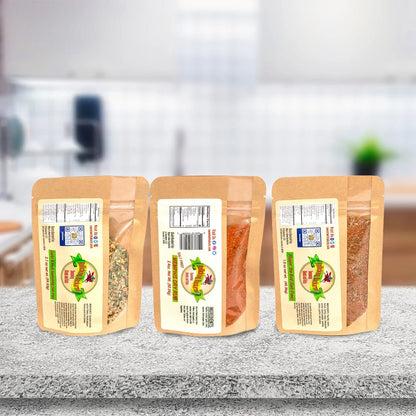 flippin the bird salt free, memphis dry rub, and garlic and herb seasoning salt free seasoning blends next to each other on a wooden counter top